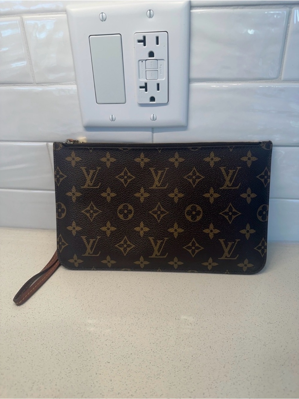 Louis Vuitton Monogram Canvas Wrist Pouch in Brown